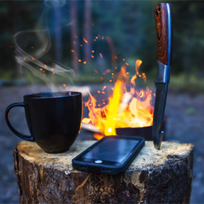 image of a phone near a campfire